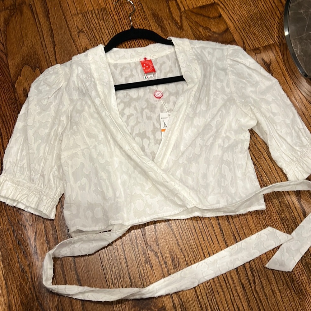 Never worn beautiful linen wrap around top